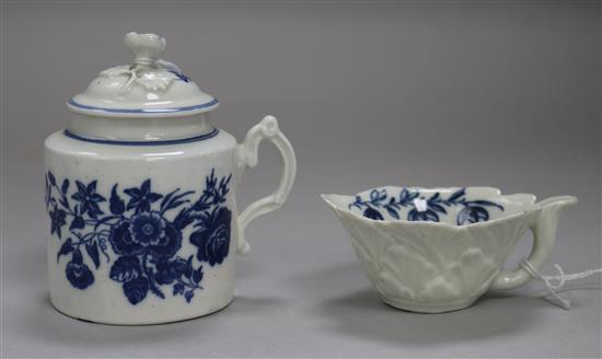 A Worcester Mansfield pattern butter boat, c.1760 and a Worcester floral pattern mustard pot and cover, c.1770, 9cm and 9.5cm